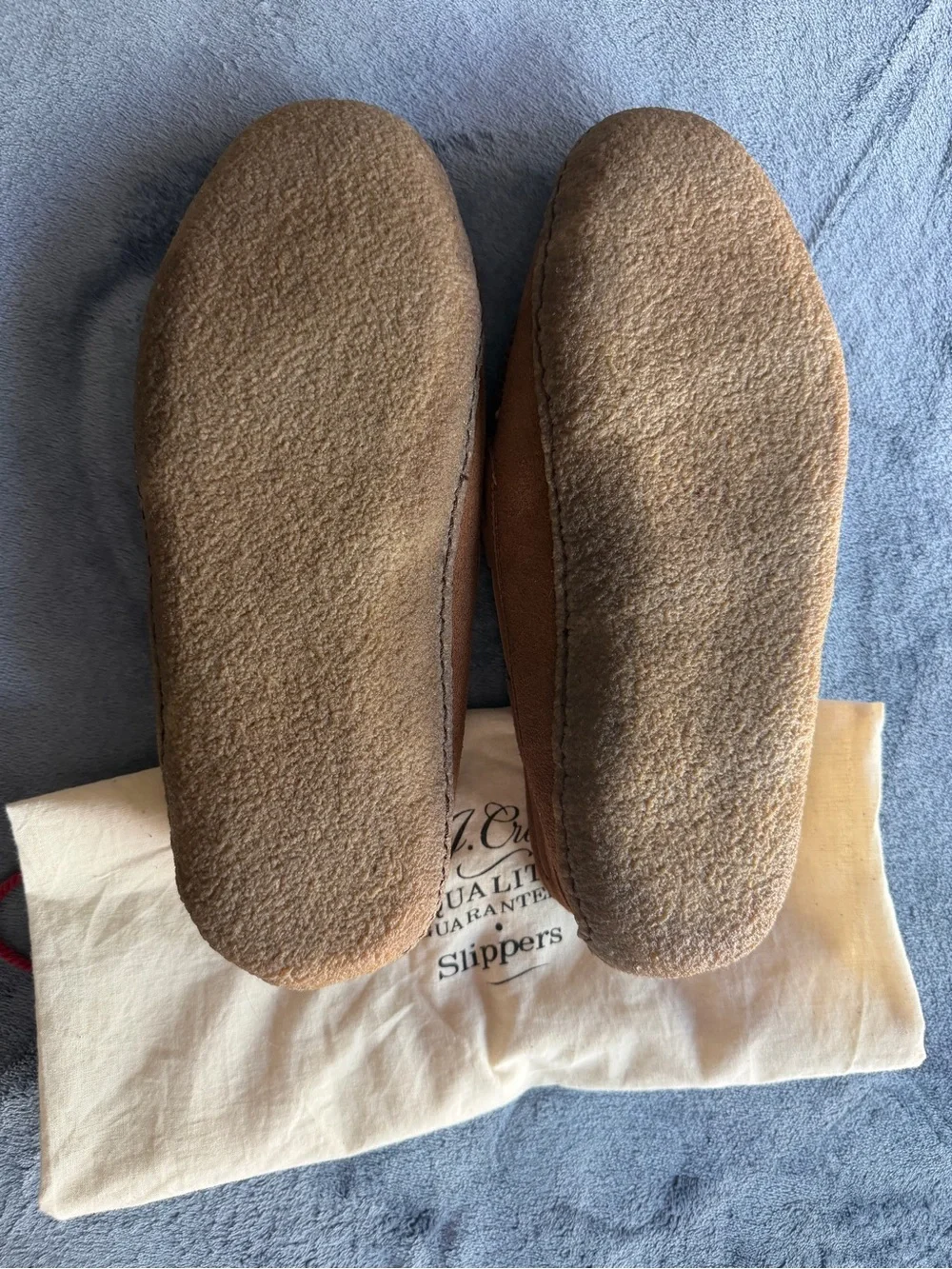 J.Crew slippers feature a warm shearling lining and a classic moccasin